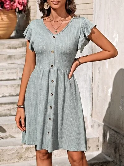 Dresses for city tours-Decorative Button Ruffled V-Neck Dress